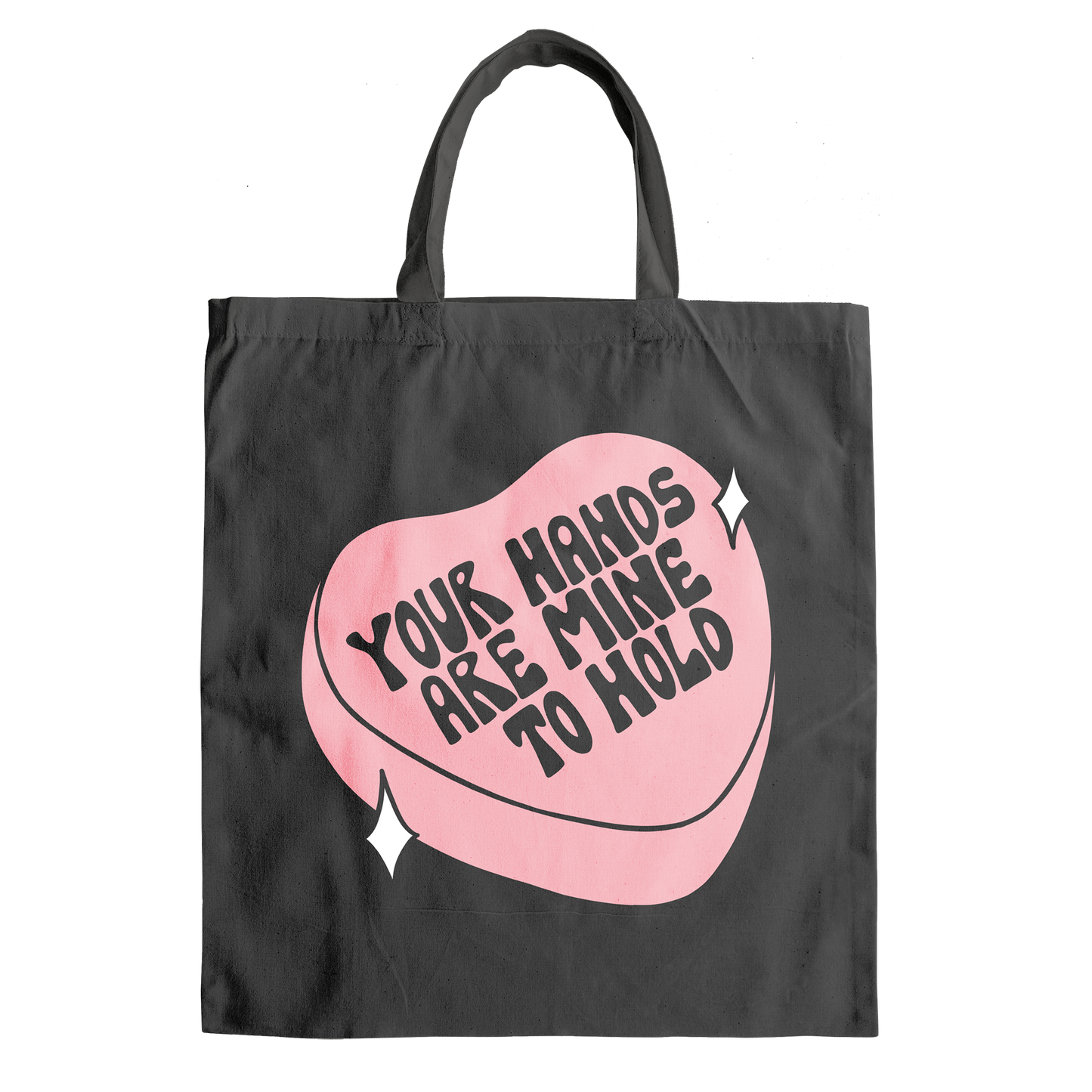 Black tote with pink heart that says Your Hands Are Mine to Hold